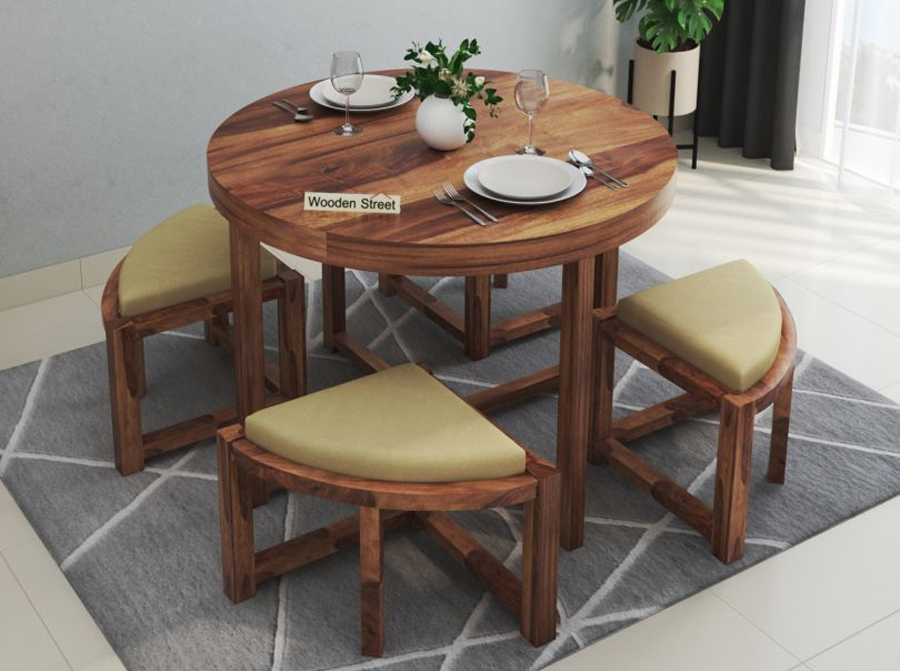 round dining table from woodenstreet